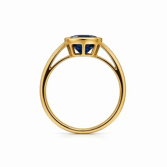 Deep blue Australian sapphire ring top view — bezel set 18K yellow gold | Tayam Jewellery Sydney