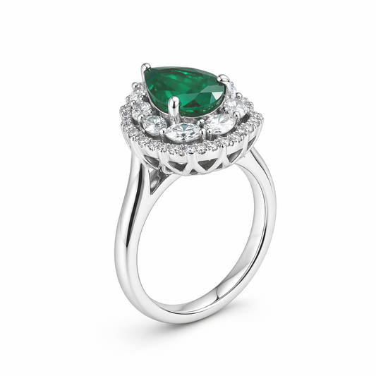 Pear cut emerald ring top view — marquise and brilliant-cut diamond sunburst halo | Tayam Jewellery Sydney