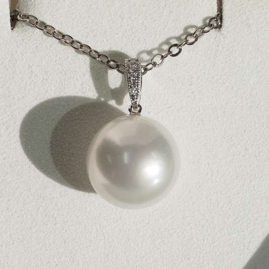 Large South Sea pearl pendant close-up — silver overtones AAA lustre 18K white gold | Tayam Jewellery Sydney