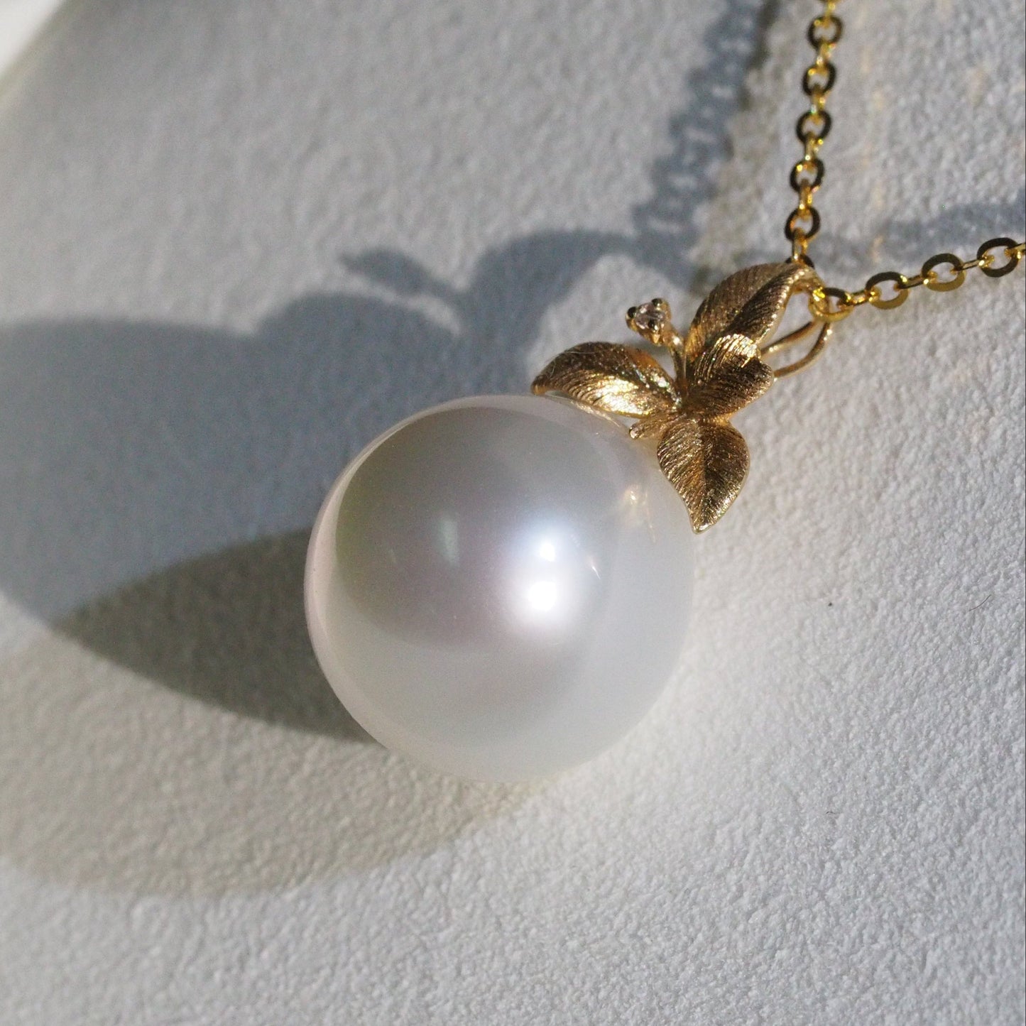 South Sea pearl pendant side view — unique leaf design AAA lustre 18K yellow gold | Tayam Sydney CBD