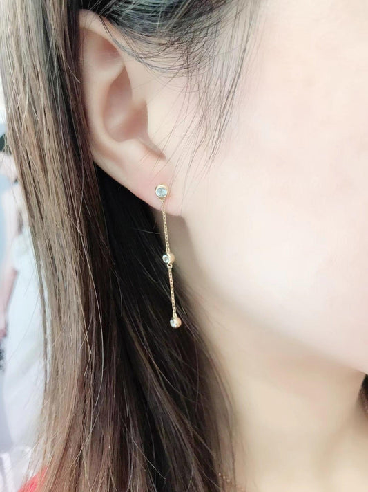 Delicate gold drop earring with clear stones, perfect for Sydney jewellery lovers seeking elegant style.
