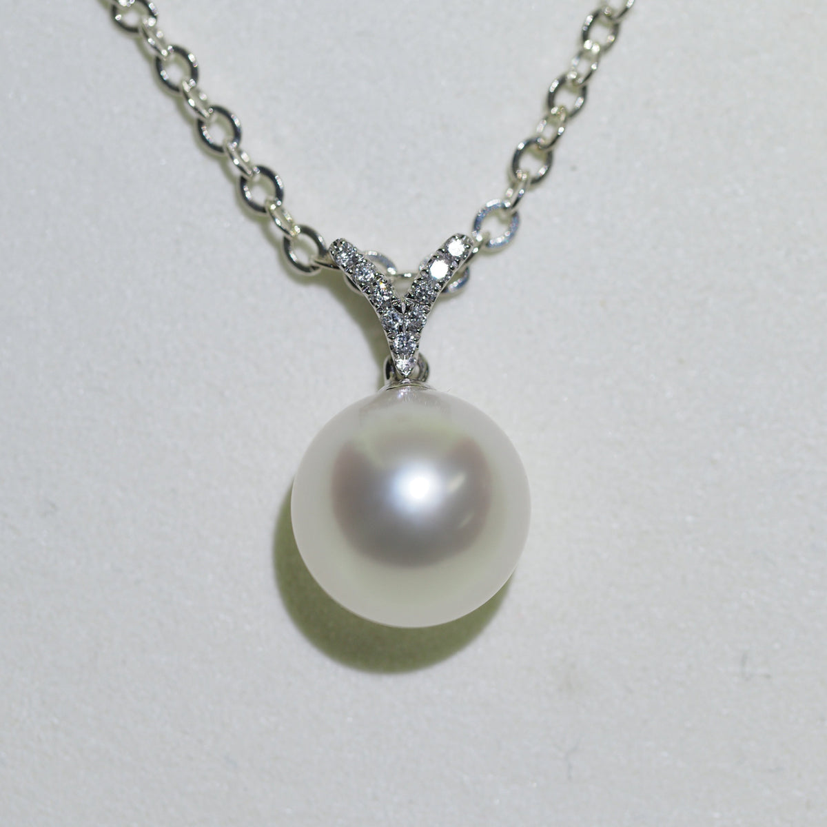 South Sea pearl pendant close-up — round pearl pink overtones 9K white gold | Tayam Jewellery Sydney