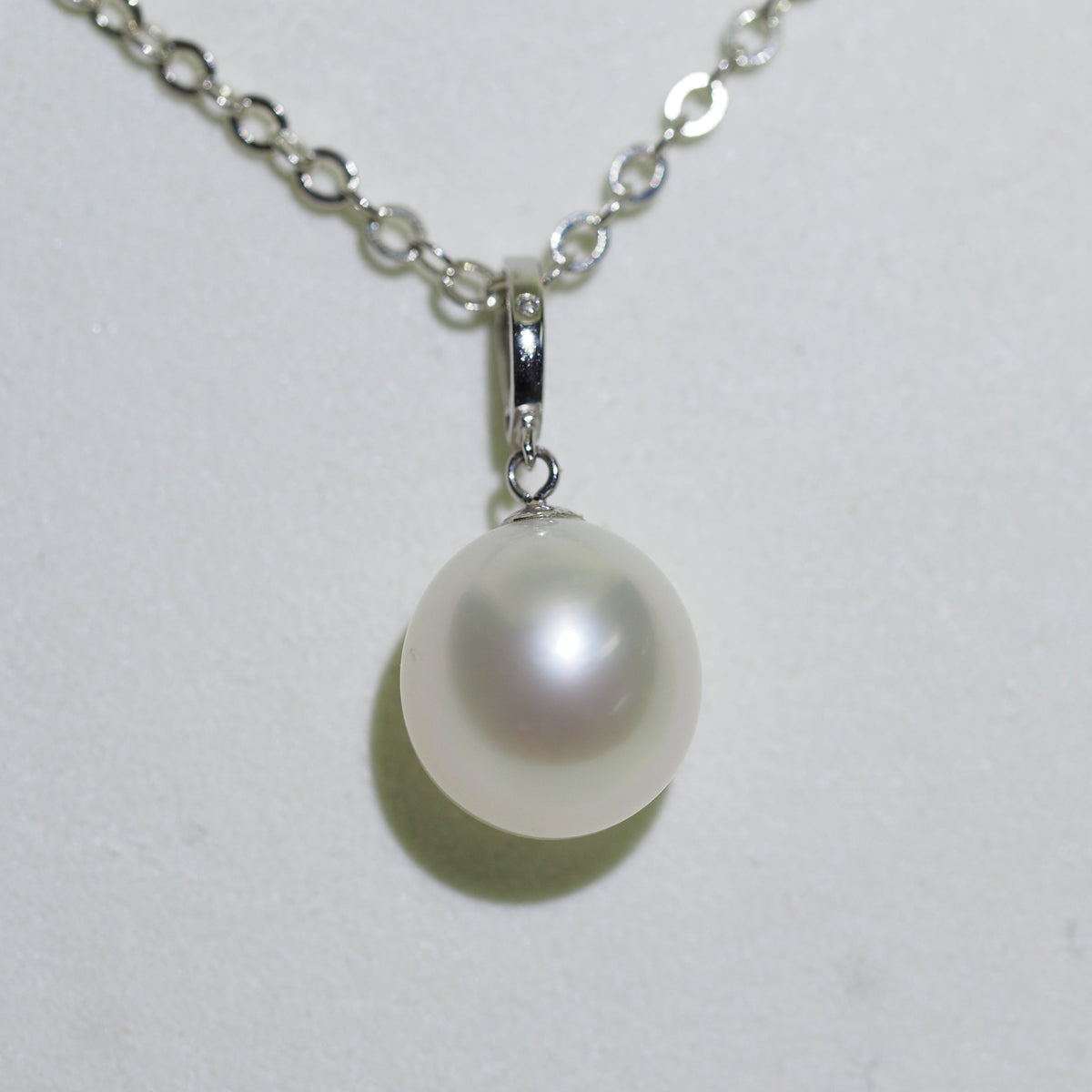 South Sea pearl pendant close-up — oval pearl AAA lustre platinum | Tayam Jewellery Sydney