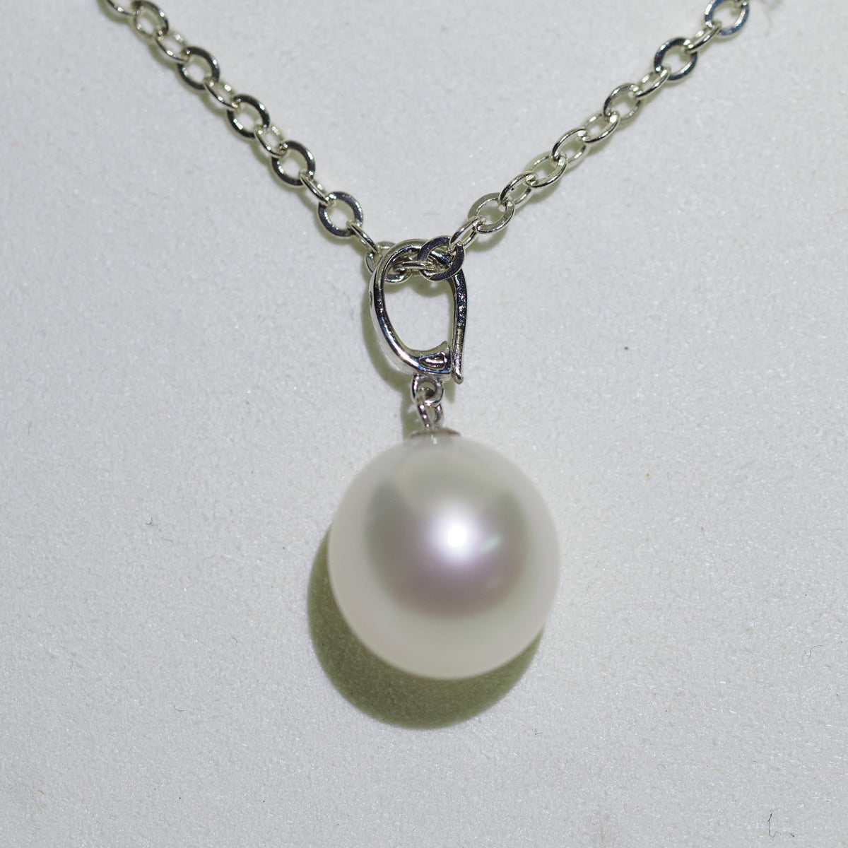 South Sea pearl pendant side view — natural diamond platinum | Tayam Sydney CBD