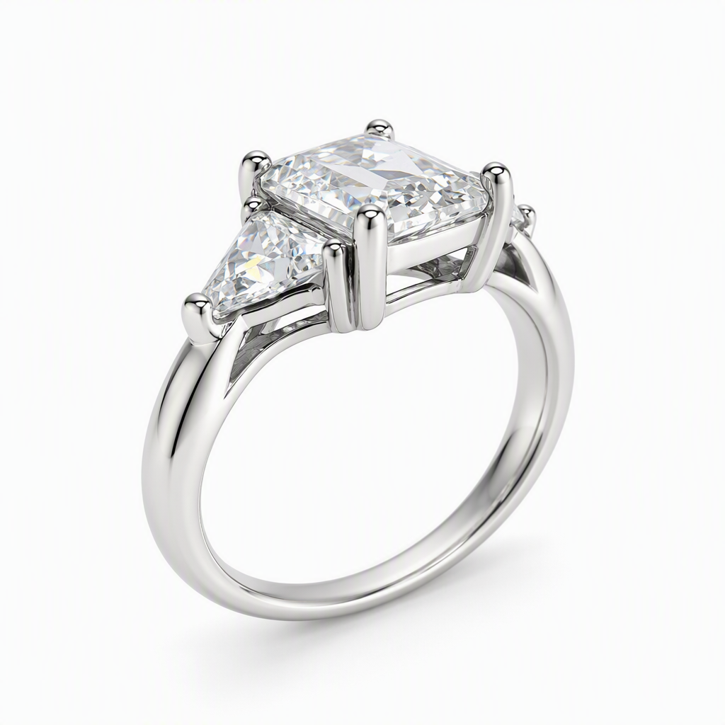 Emerald cut trilogy ring close-up — trapezoid side stones, D/E VVS lab grown | Tayam