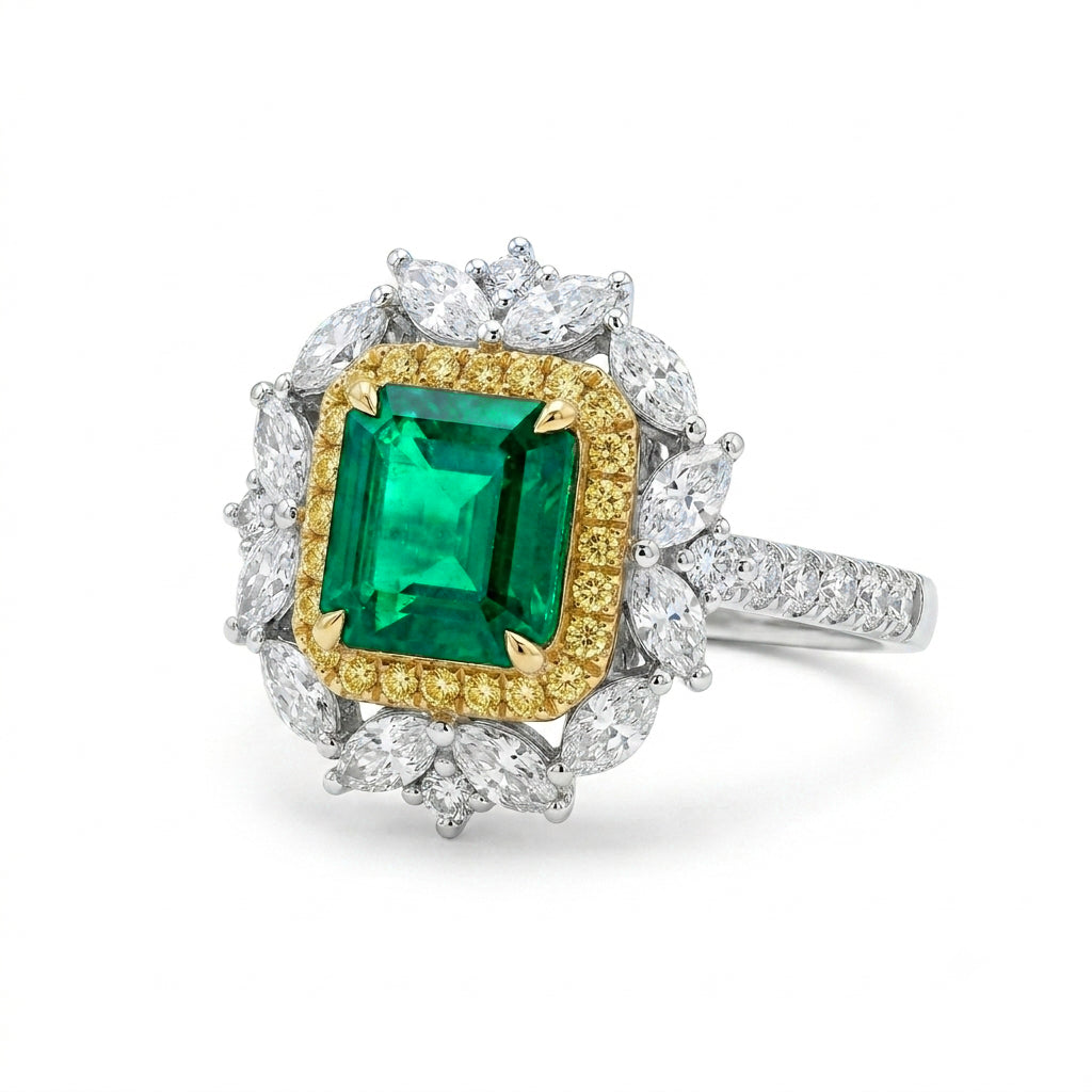 Green emerald engagement ring worn on hand — GUILD certified bespoke jewellery Sydney CBD