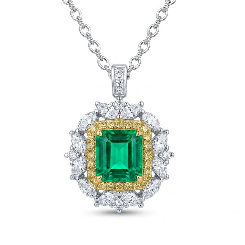Coloured gemstone engagement ring Sydney — natural emerald with yellow and white diamond double halo