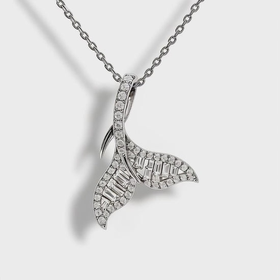 Close-up video of Mermaid Tail Pendant, 45mm design with 26.8pt natural diamonds sparkling under studio light