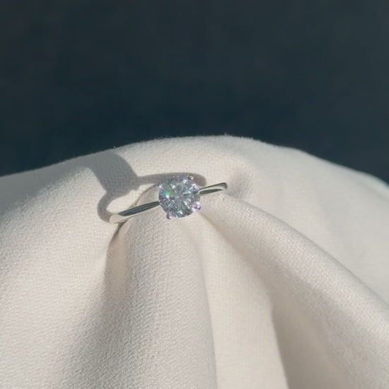 Close-up of a bespoke 1ct lab grown diamond solitaire engagement ring in 18k white gold, paired with a matching wedding band, handcrafted by Tayam Jewellery in Sydney