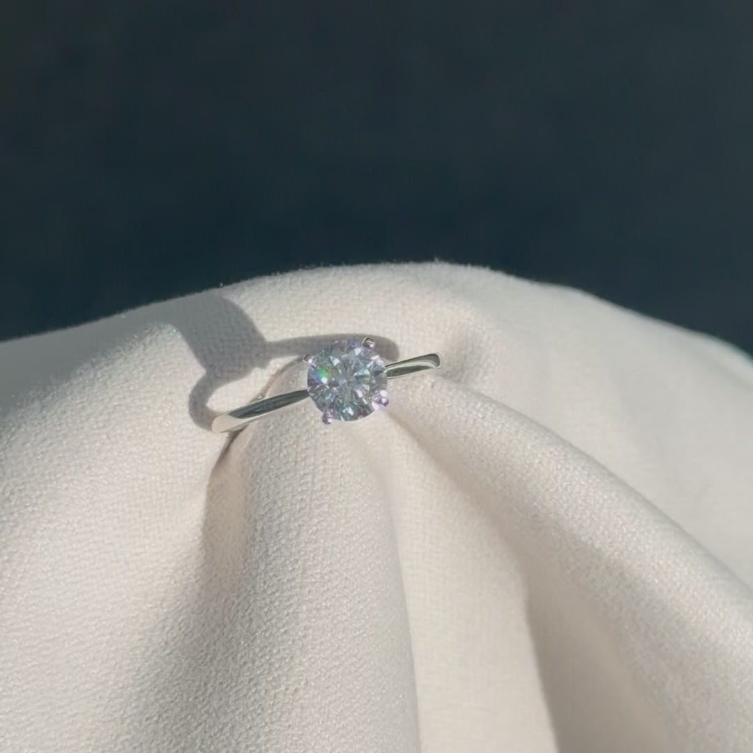 Close-up of a bespoke 1ct lab grown diamond solitaire engagement ring in 18k white gold, paired with a matching wedding band, handcrafted by Tayam Jewellery in Sydney