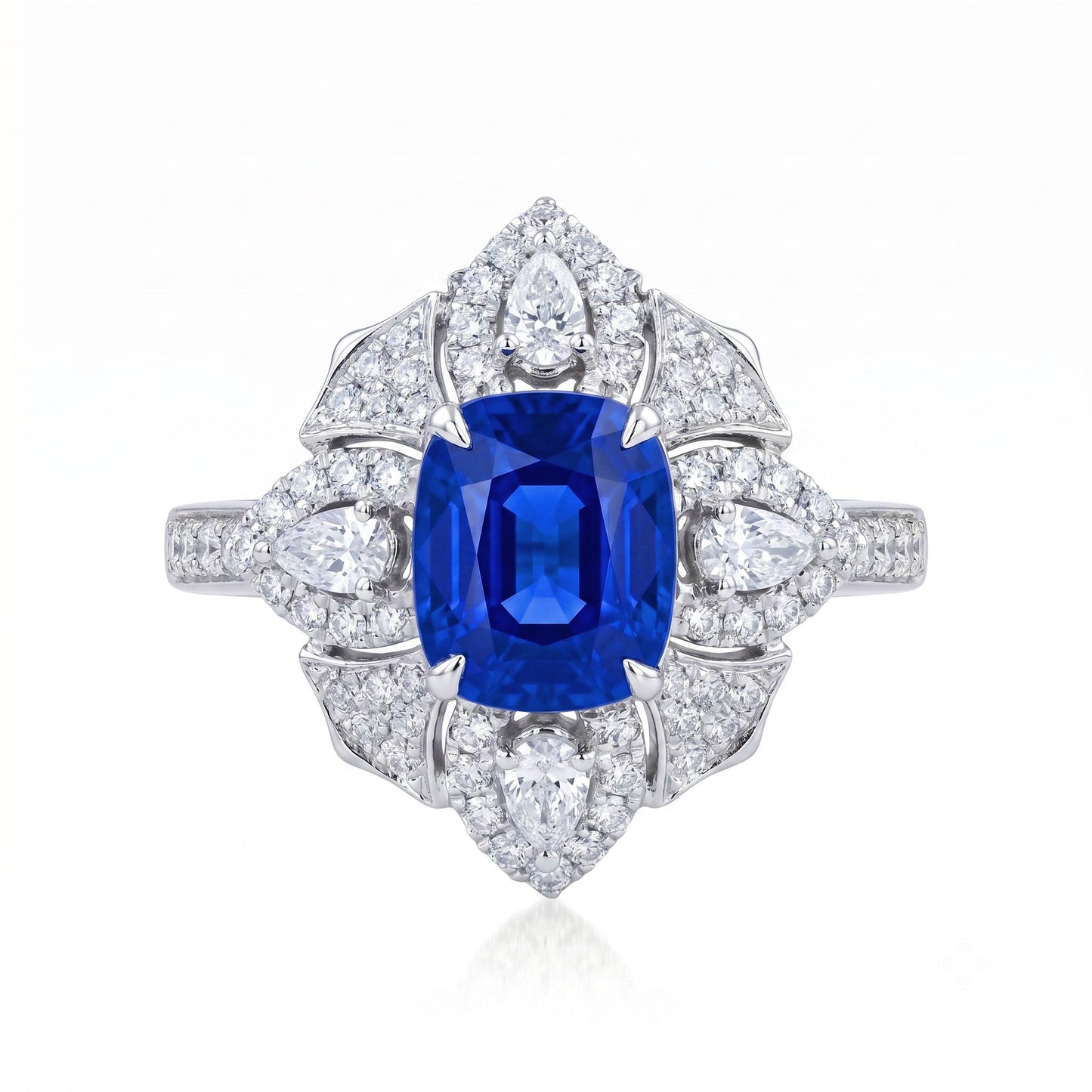 Royal Blue Sapphire engagement ring with diamond halo setting in 18K gold | Tayam Jewellery Sydney