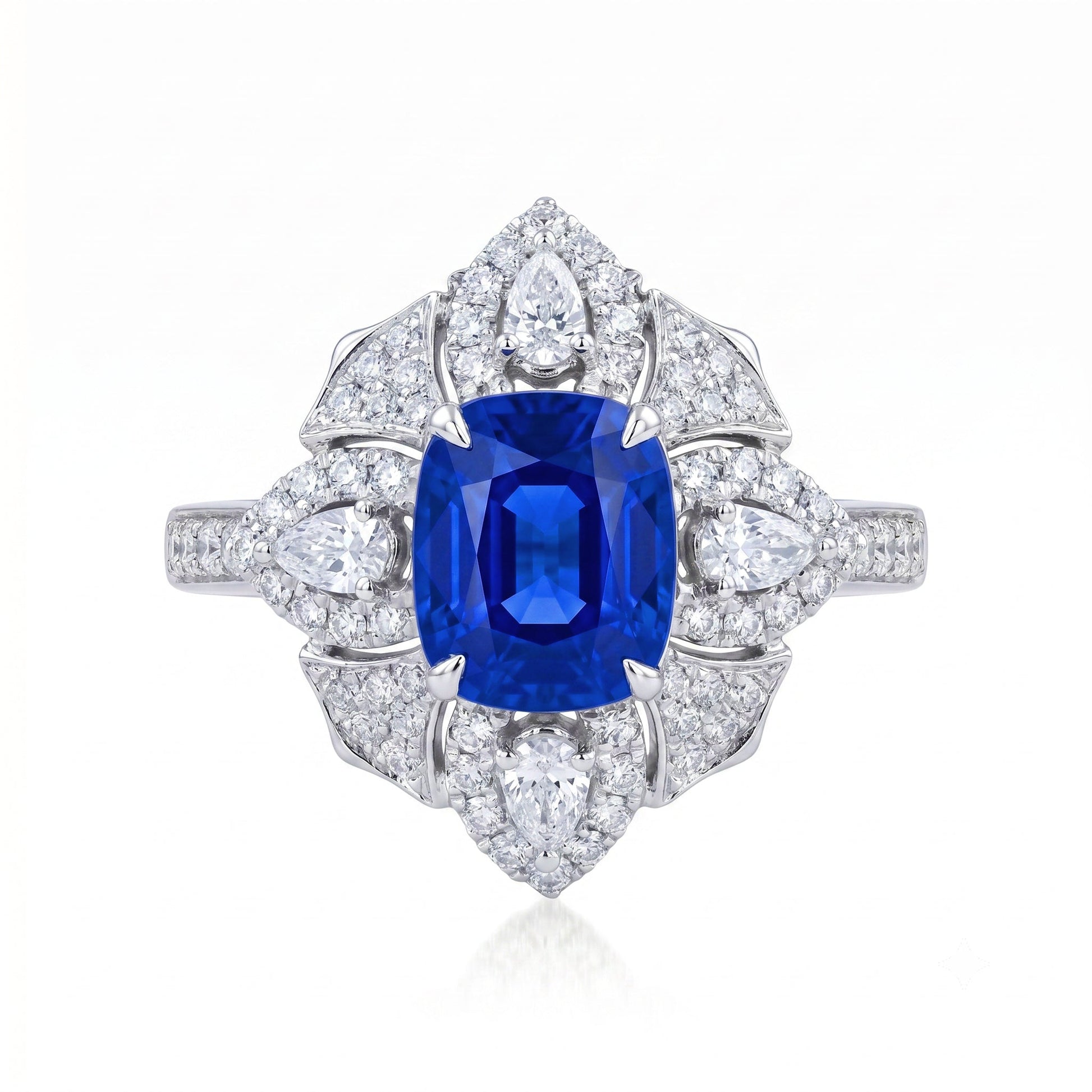 Royal Blue Sapphire engagement ring with diamond halo setting in 18K gold | Tayam Jewellery Sydney