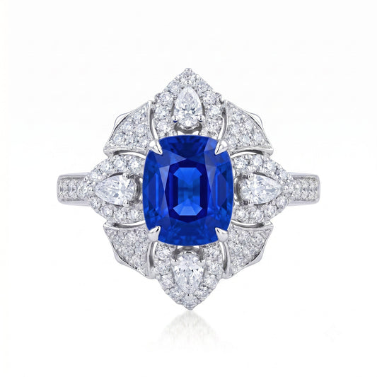 Royal Blue Sapphire engagement ring with diamond halo setting in 18K gold | Tayam Jewellery Sydney