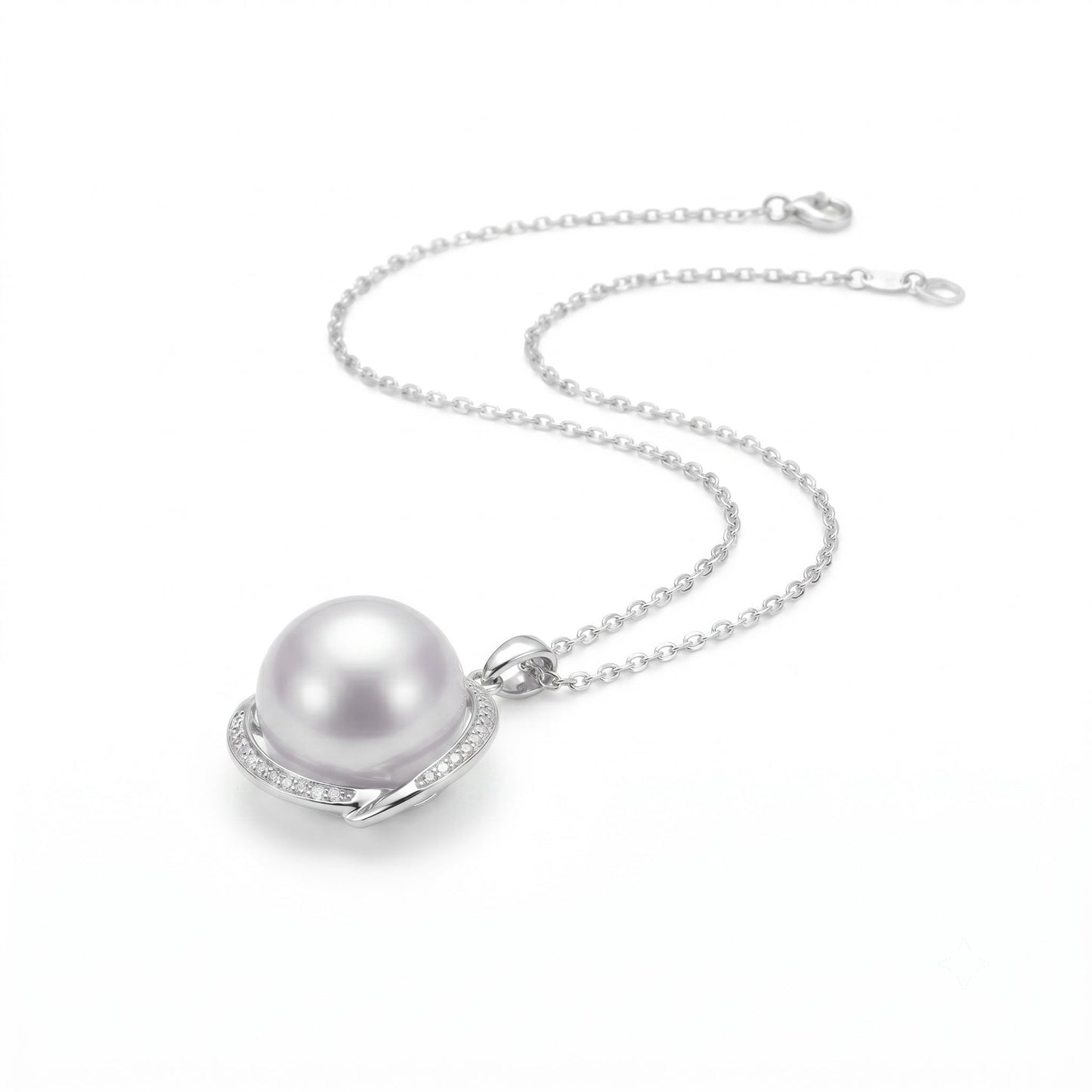 AAA lustre South Sea Pearl pendant showing pink overtone and diamond detail in 18K white gold