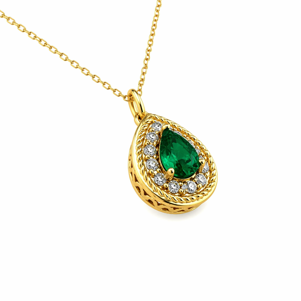 Emerald pear cut pendant close-up — diamond halo with rope-textured border | Tayam Jewellery Sydney