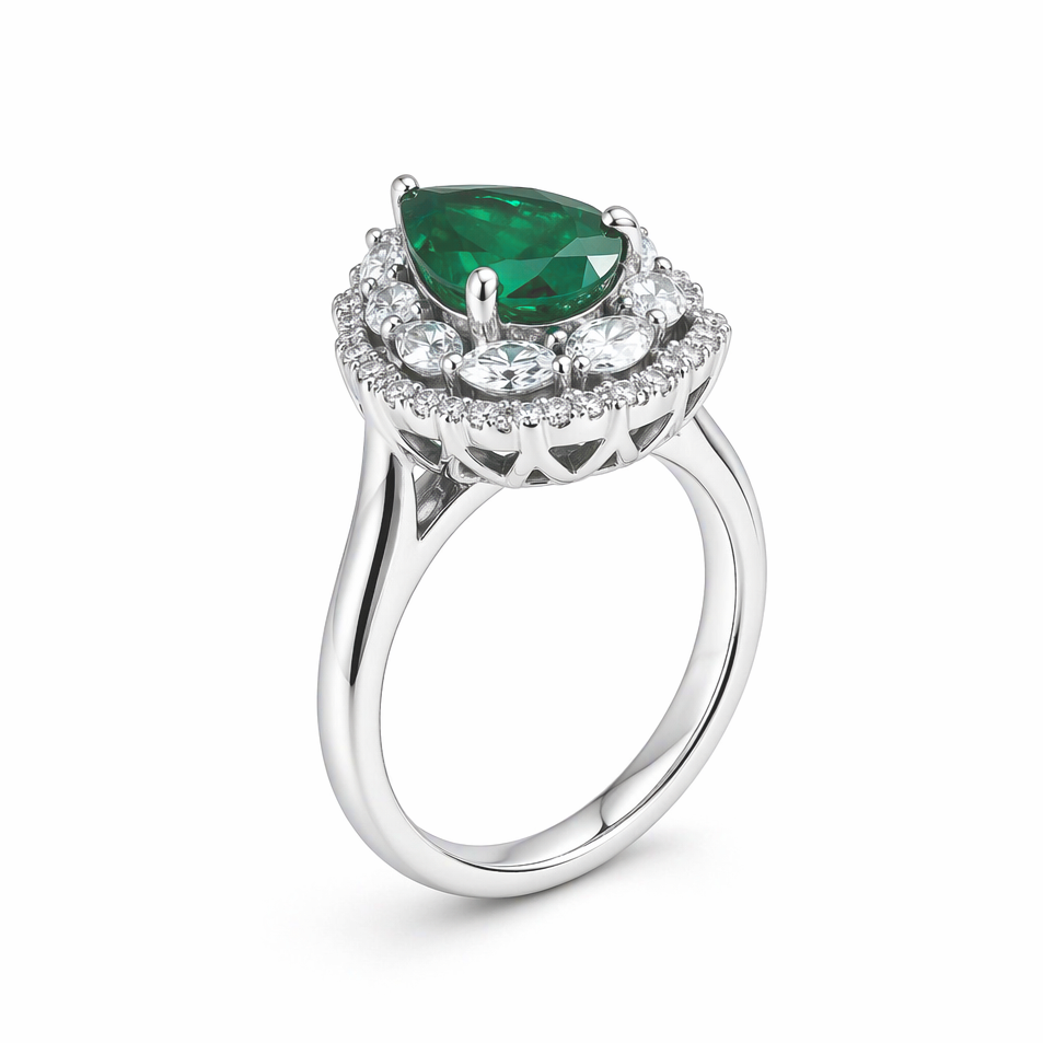 Pear cut emerald ring top view — marquise and brilliant-cut diamond sunburst halo | Tayam Jewellery Sydney