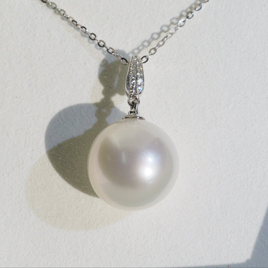 Rare large South Sea pearl pendant close-up — gem-like iridescence 18K white gold | Tayam Jewellery Sydney