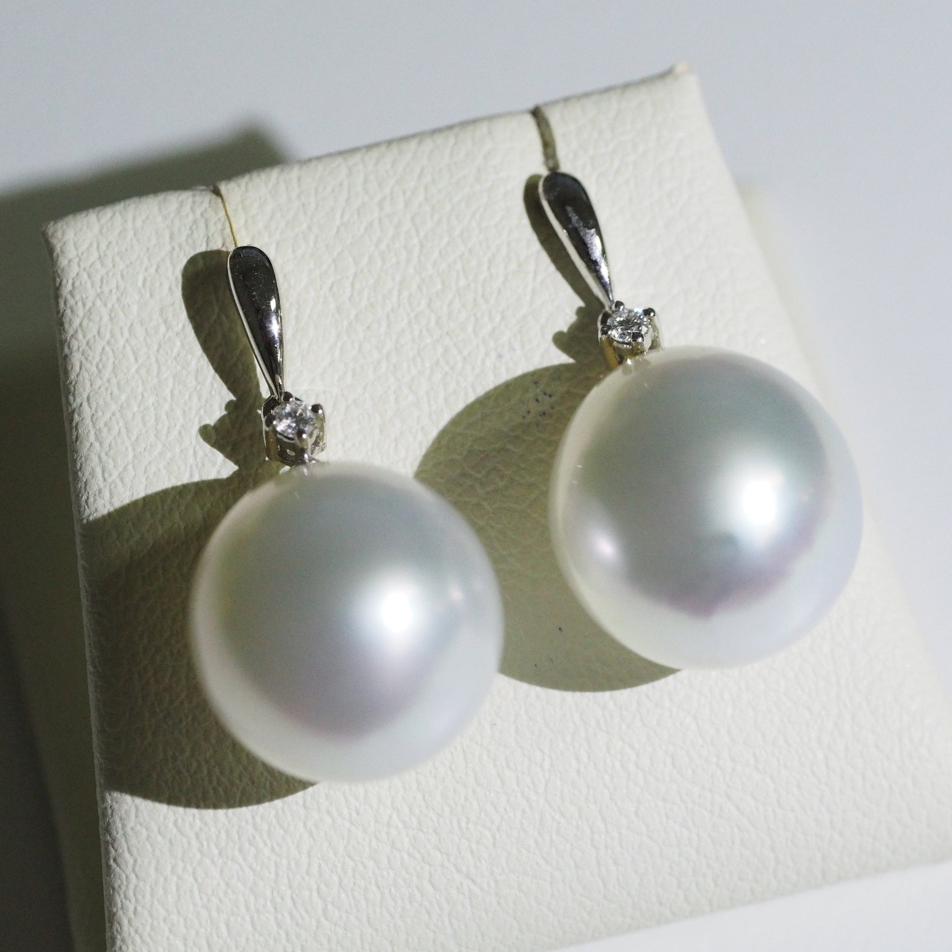 South Sea pearl drop earrings close-up — pink blue overtones AAA lustre 18K white gold | Tayam Jewellery Sydney