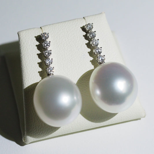 South Sea pearl drop earrings close-up — pink blue green overtones AAA lustre | Tayam Jewellery Sydney