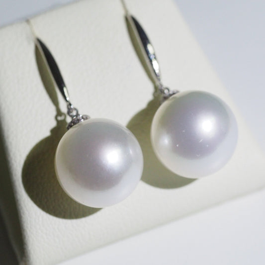 South Sea pearl drop earrings close-up — round pearl AAA lustre 18K white gold | Tayam Jewellery Sydney