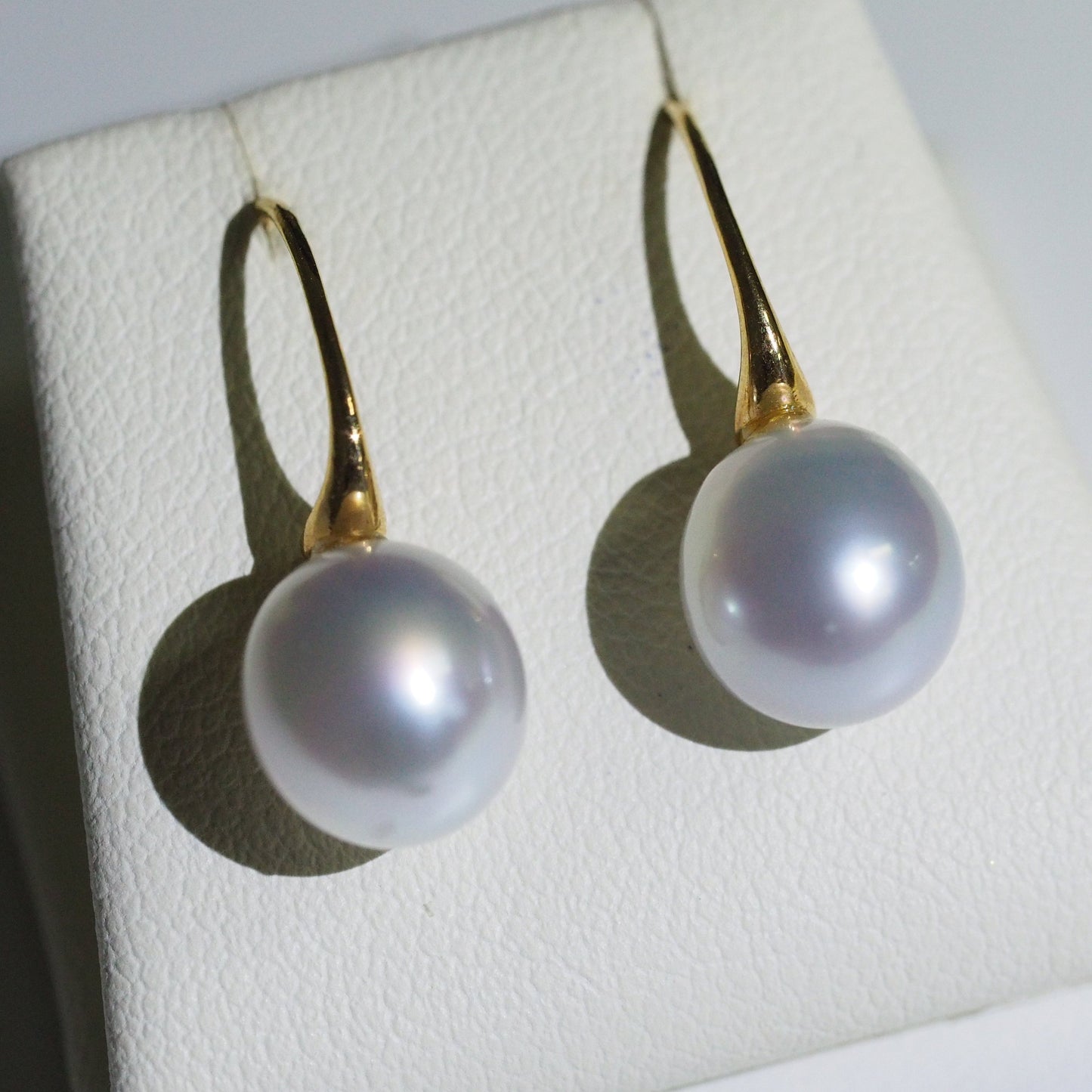 South Sea pearl earrings close-up — blue overtones AAA lustre 18K yellow gold | Tayam Jewellery Sydney