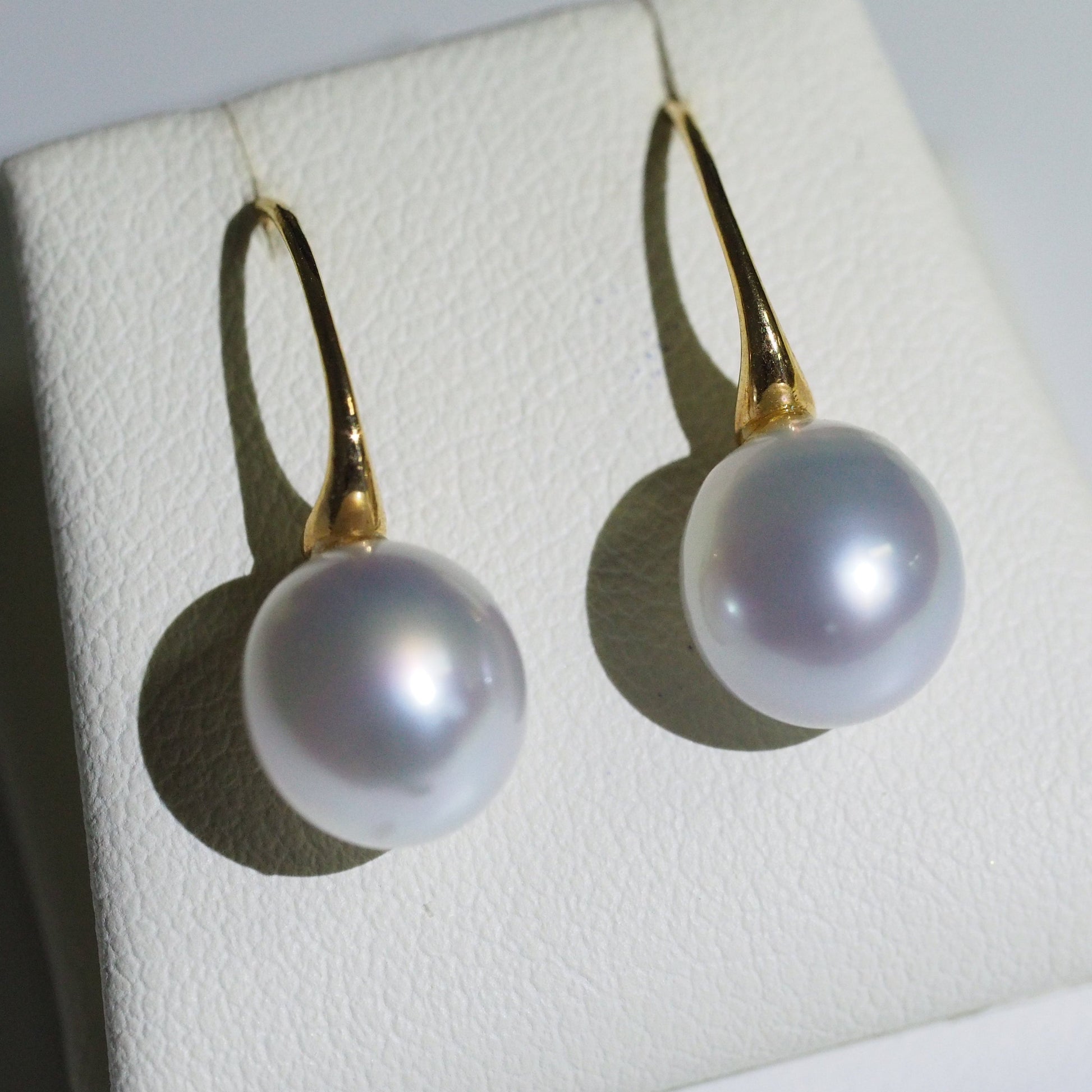 South Sea pearl earrings close-up — blue overtones AAA lustre 18K yellow gold | Tayam Jewellery Sydney