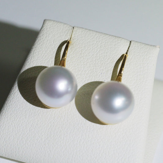 South Sea pearl earrings close-up — pink blue overtones AAA lustre 18K yellow gold | Tayam Jewellery Sydney