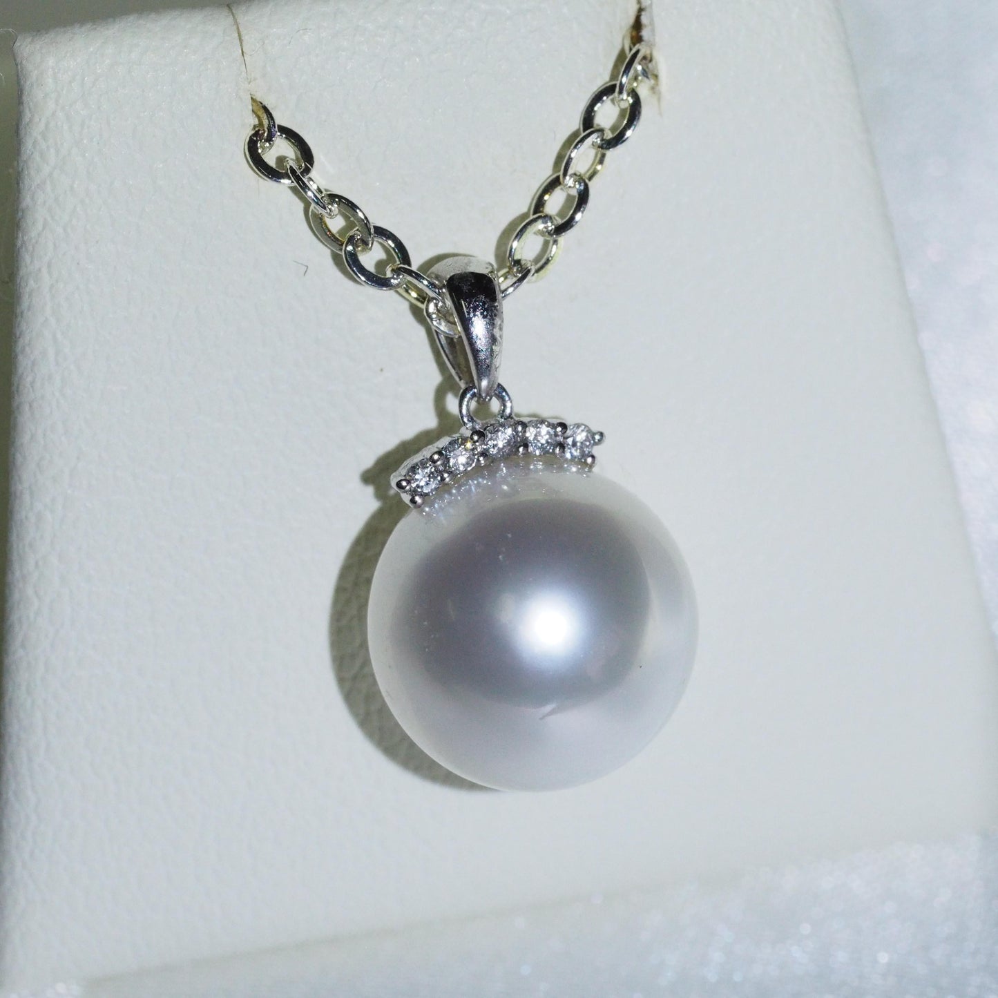 South Sea pearl pendant close-up — round pearl with diamond crown 9K white gold | Tayam Jewellery Sydney