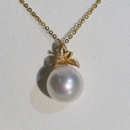 South Sea pearl pendant close-up — hand-brushed fruit and leaf motif 18K yellow gold | Tayam Jewellery Sydney