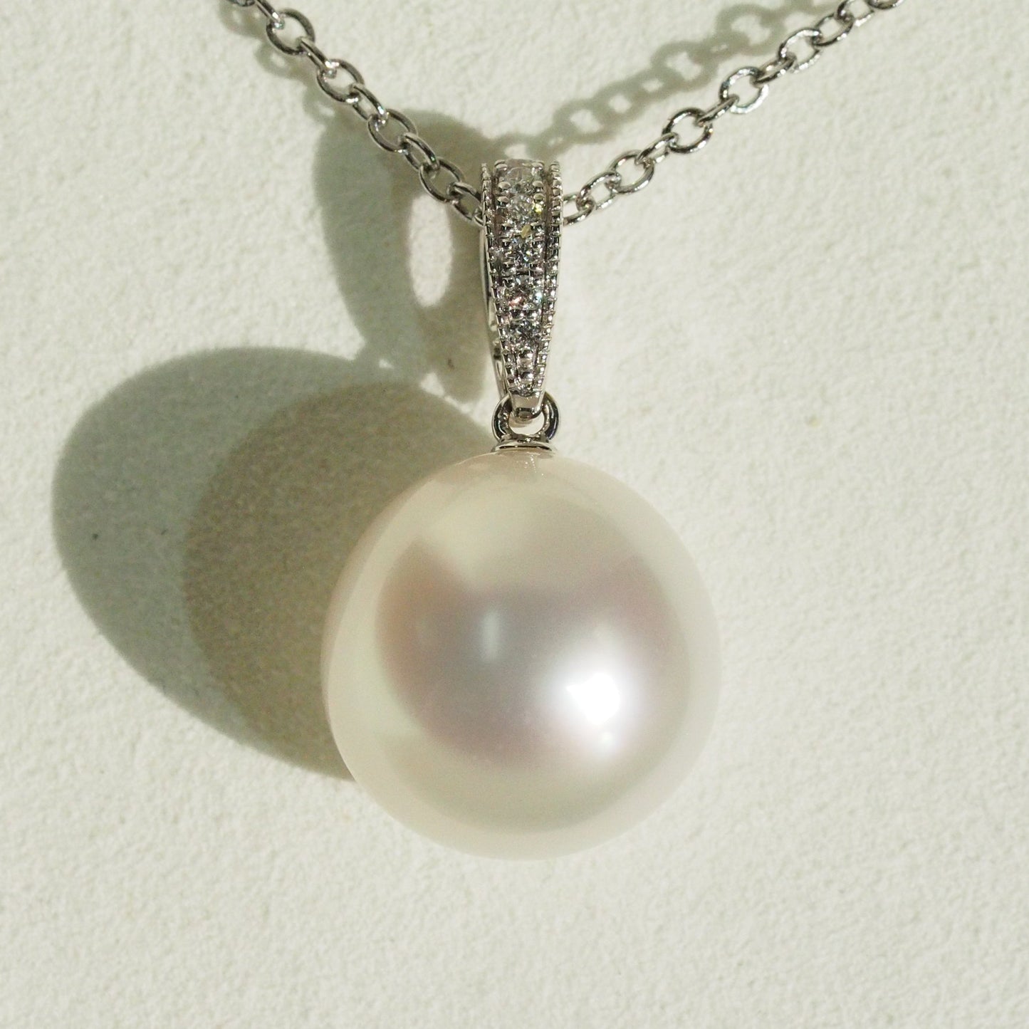 South Sea pearl pendant close-up — pink blue overtones AAA lustre 18K white gold | Tayam Jewellery Sydney
