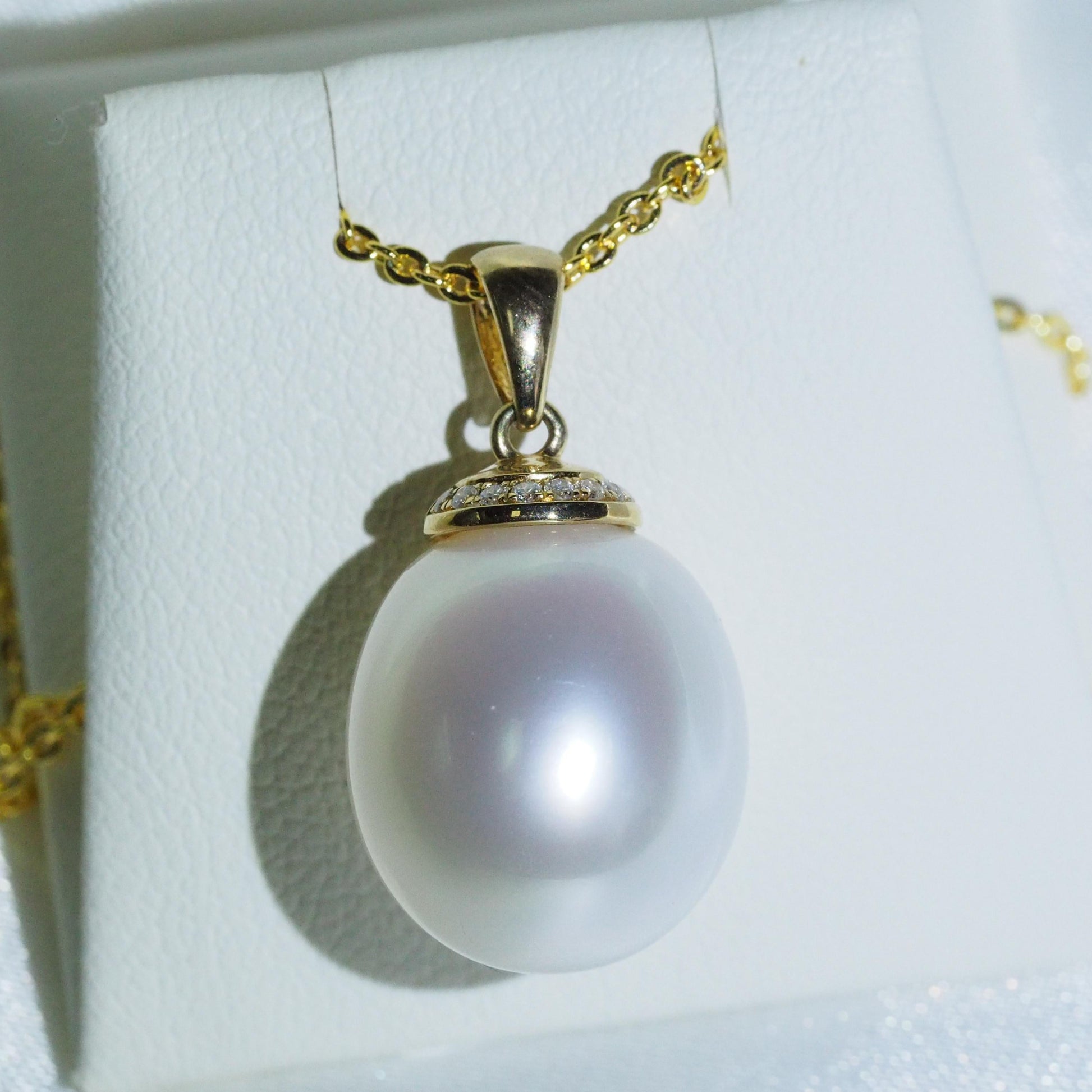 South Sea pearl pendant close-up — oval pearl pink overtones 9K yellow gold | Tayam Jewellery Sydney