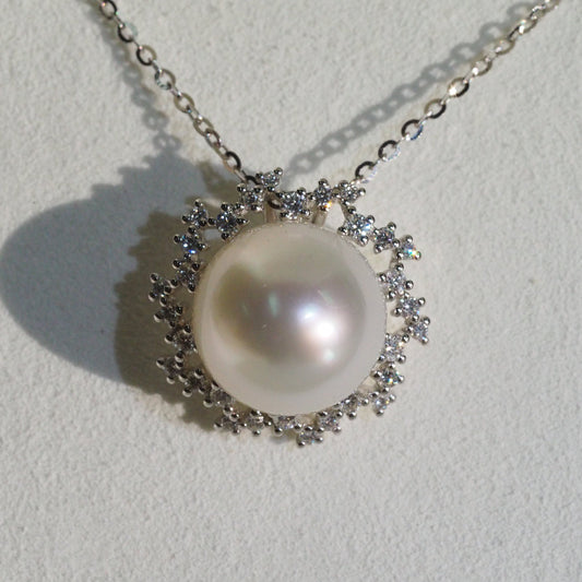 South Sea pearl pendant close-up — diamond starburst pink blue overtones 18K white gold | Tayam Jewellery Sydney